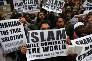 muslims-carrying-banners-300x200
